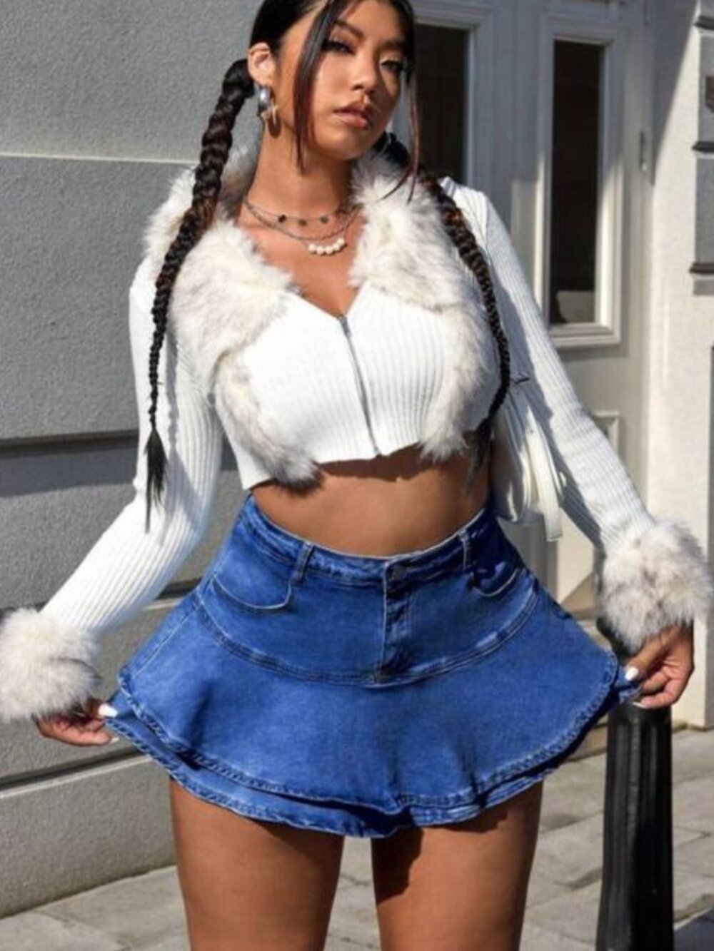 Women's ruffled denim mini skirt pleated and flared with built-in shorts.